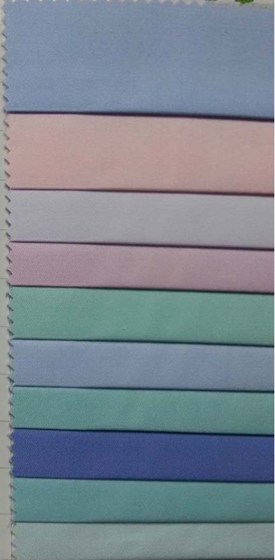 DG- SNYU 淺灰蘭T65/C35  45/2*21/138*71 耐漂白水 耐氯漂 制服 Anti bleaching bleaching resistant 45度照